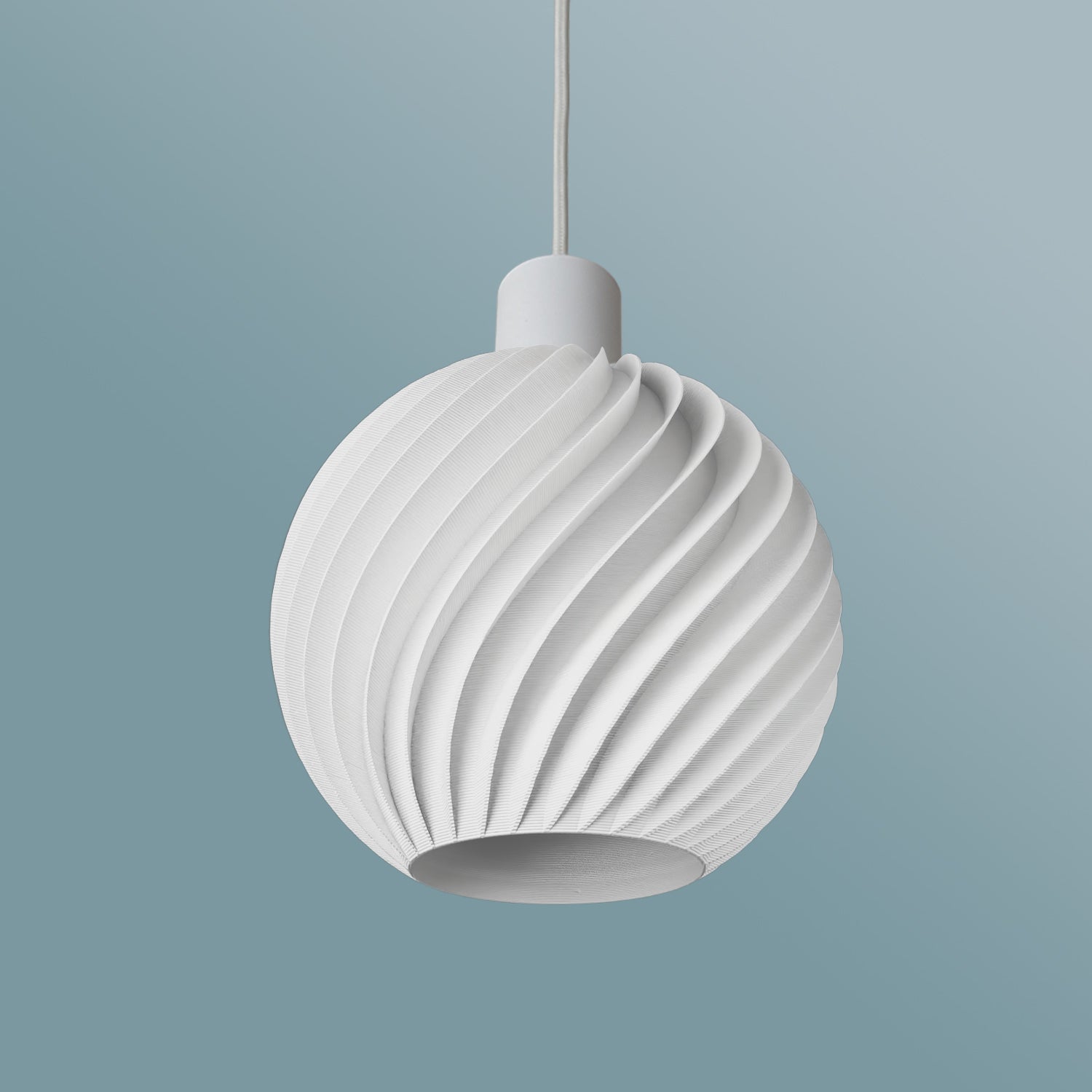 Ball Wave by Martin Žampach | Leuchte LED Pendelleuchte - Ø20cm vor blauem Huntergrund